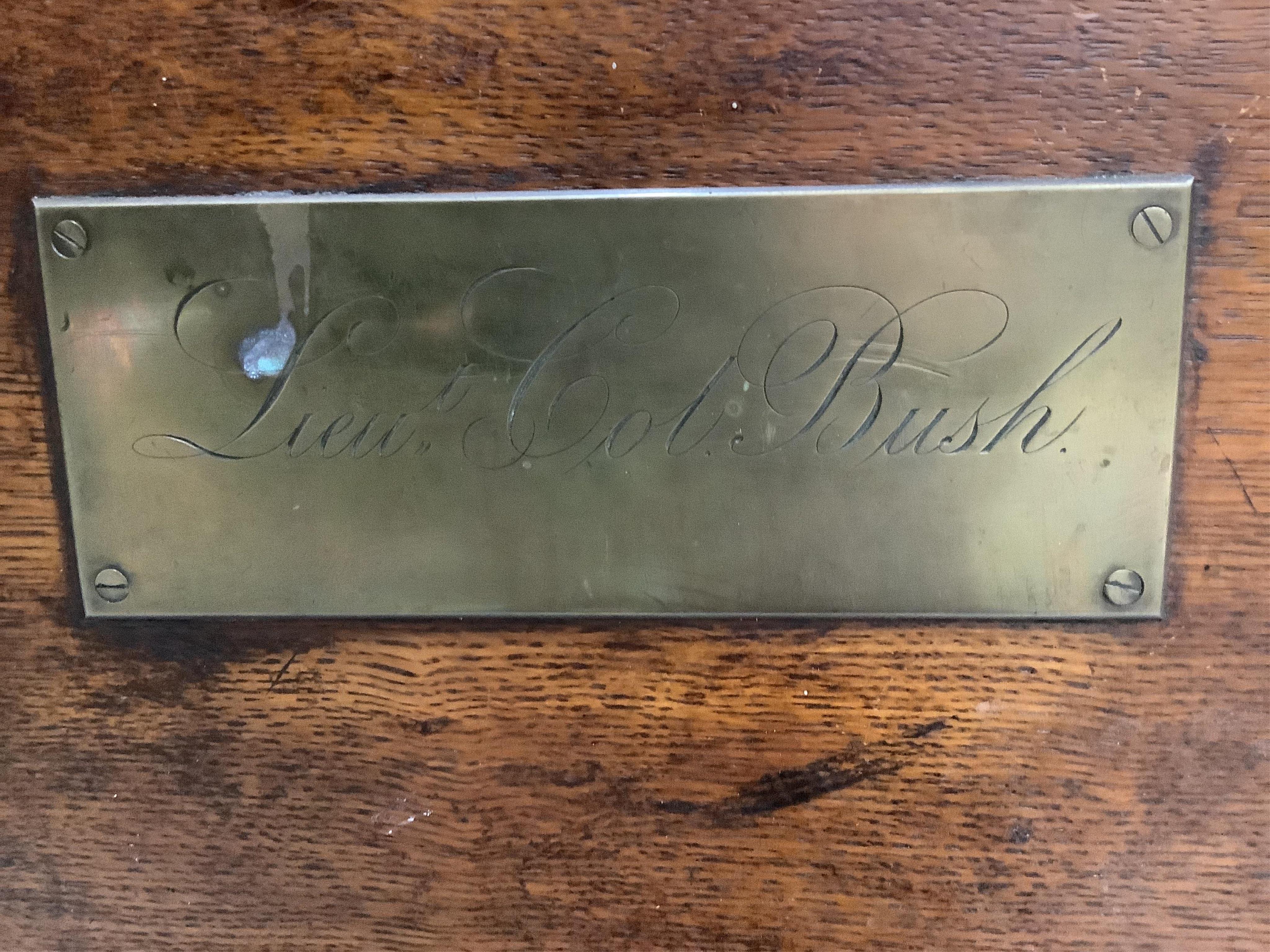 A Victorian oak and iron bound silver chest, brass plaque engraved Lieut. Col. Bush, width 86cm, depth 55cm, height 60cm